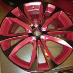 black powder coated wheels with toreto red insets